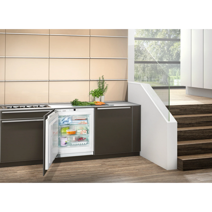 Integrated under-worktop freezer with NoFrost